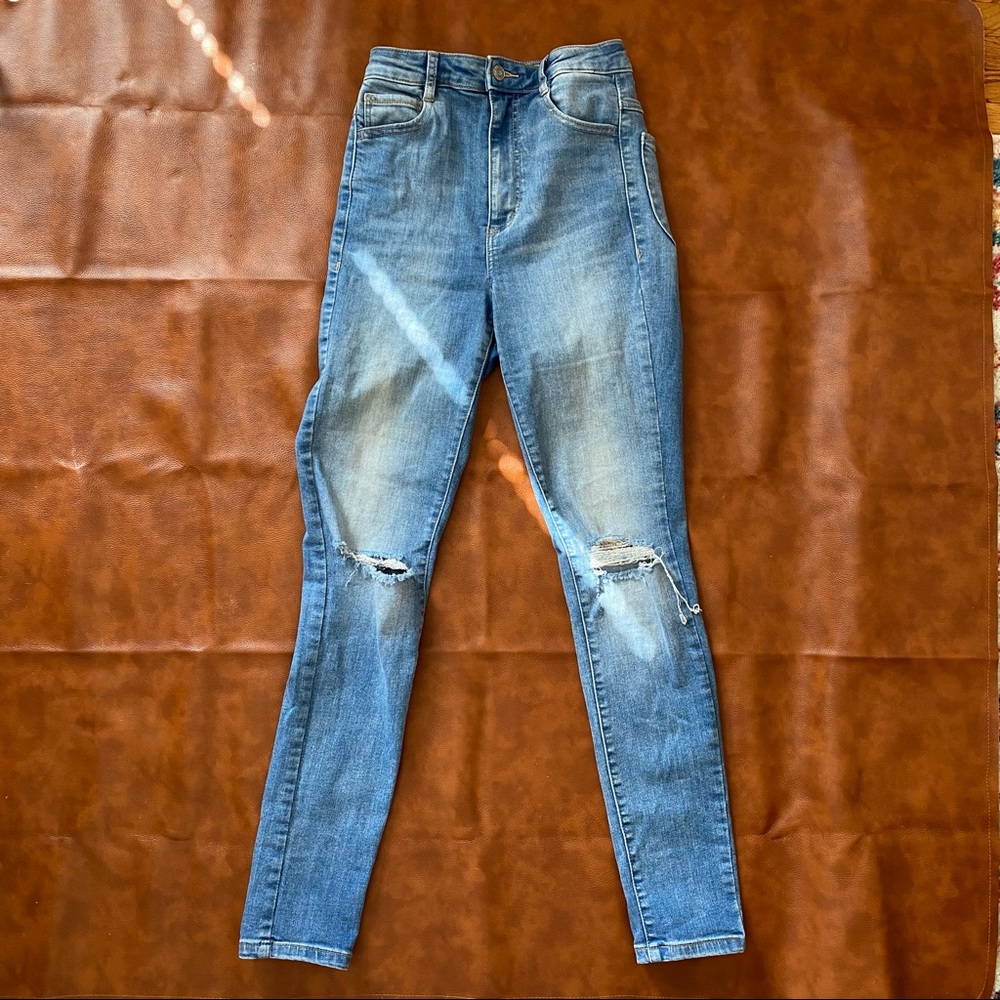 Garage Super High Rise Light Wash Skinny Jeggings with Distressed Knees